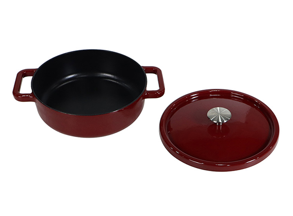 Metal cast iron enameled casserole dark red color